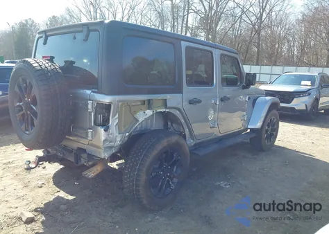 2021 Jeep Wrangler 4Xe Unlimited Sahara 4X4 z USA, uszkodzony, nr VIN 1C4JJXP63MW742836